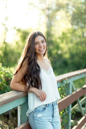 Smiling woman outside in Seattle had chipped tooth fixed with dental bonding